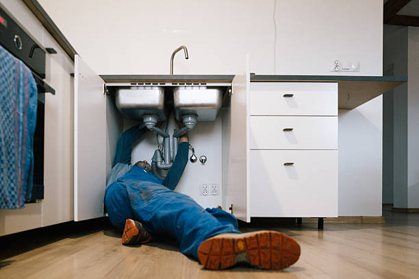 Professional Drain Cleaning technician working in West Alton, MO